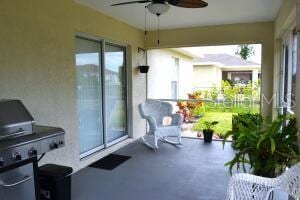 view of patio with ceiling fan