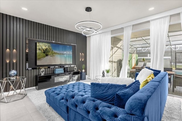 tiled cinema room with recessed lighting, baseboards, and wallpapered walls