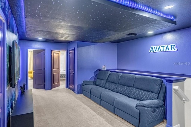 home theater featuring carpet