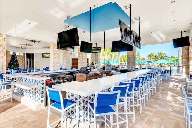 kitchen with plenty of natural light and a ceiling fan