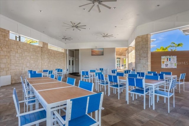 view of patio / terrace featuring a ceiling fan and outdoor dining space