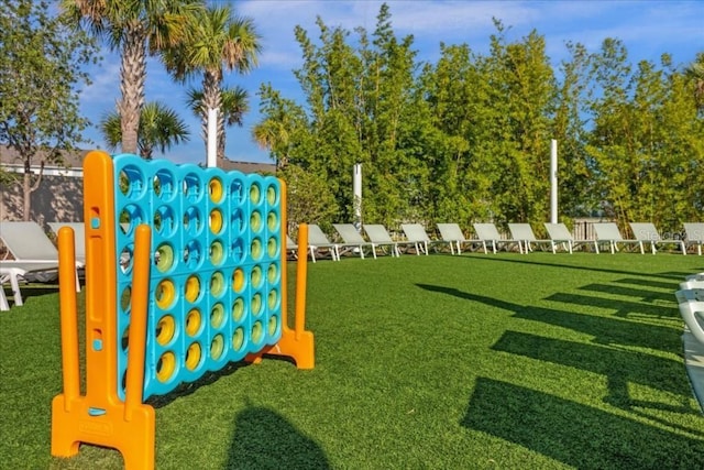 view of jungle gym with a lawn