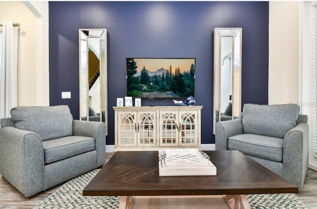 living room with light hardwood / wood-style flooring