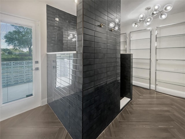 bathroom featuring parquet flooring