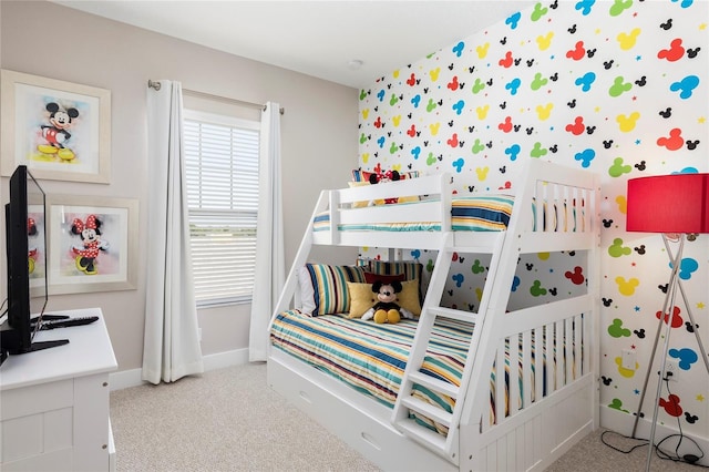 bedroom featuring light carpet