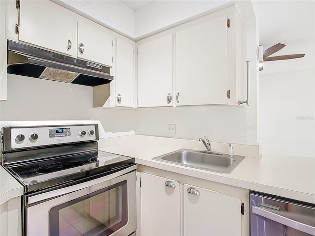 kitchen with ceiling fan, sink, white cabinets, and stainless steel appliances