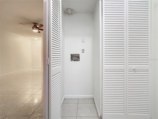 corridor featuring light tile patterned floors