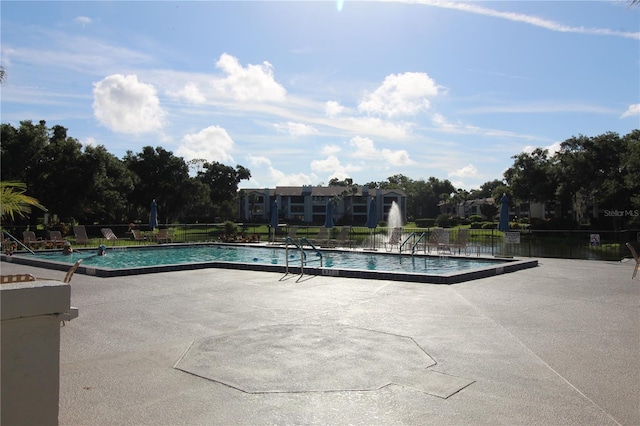 view of pool with a patio