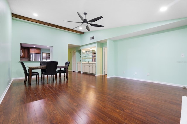 dining room with lofted ceiling, ceiling fan, and dark hardwood / wood-style floors