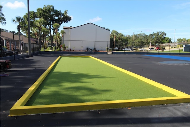 8 Escondido Cir Unit 78, Altamonte Springs, FL 32701 - view of vehicle parking featuring fence