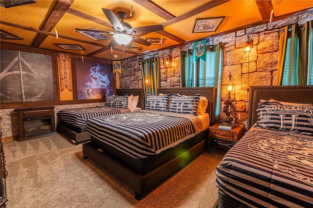 carpeted bedroom featuring beam ceiling, ceiling fan, and coffered ceiling