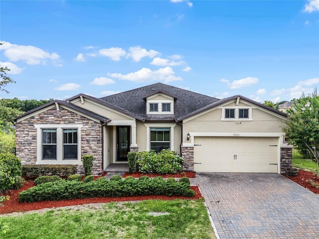 craftsman house with a garage