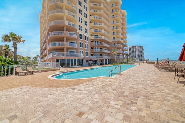 view of pool with a patio area