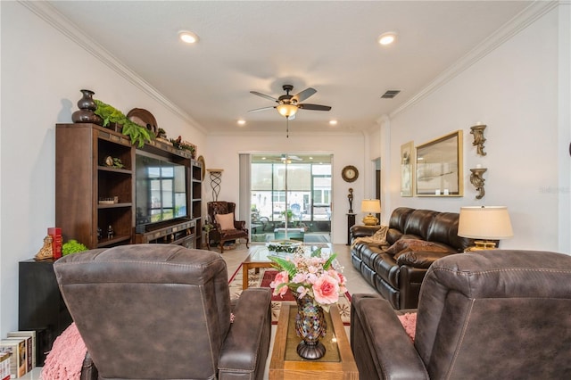 living room featuring ceiling fan and ornamental molding