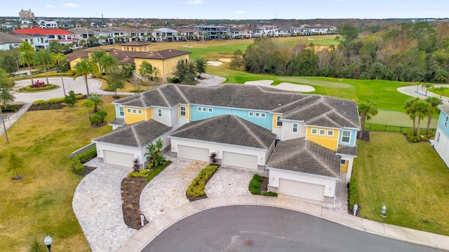 birds eye view of property featuring a residential view and golf course view