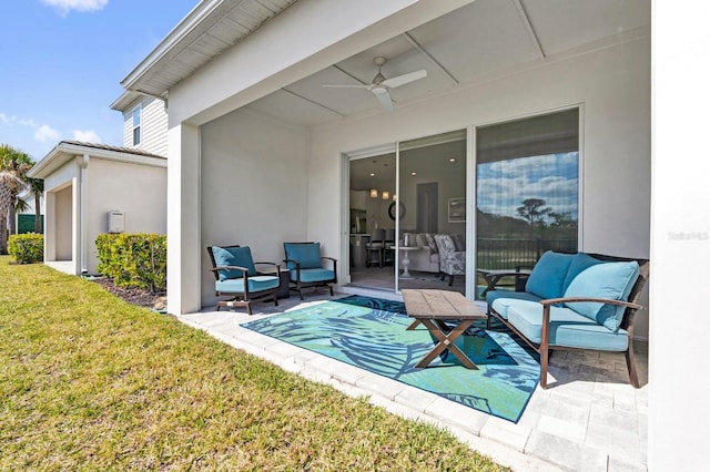 view of patio with ceiling fan and an outdoor hangout area