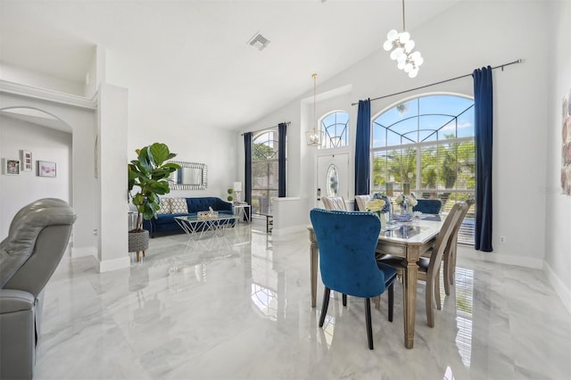 dining space featuring a chandelier