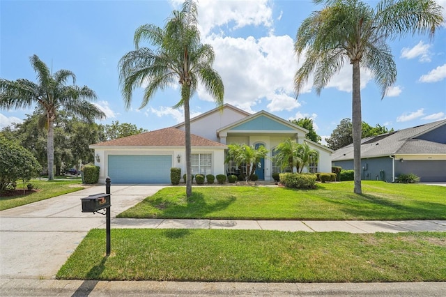 view of front facade with a front lawn and a garage