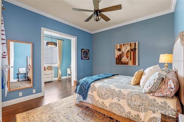 bedroom featuring a textured ceiling, ceiling fan, crown molding, and dark wood-type flooring