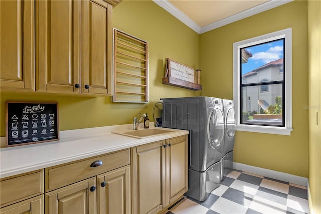 laundry room with washer and dryer, sink, cabinets, and ornamental molding