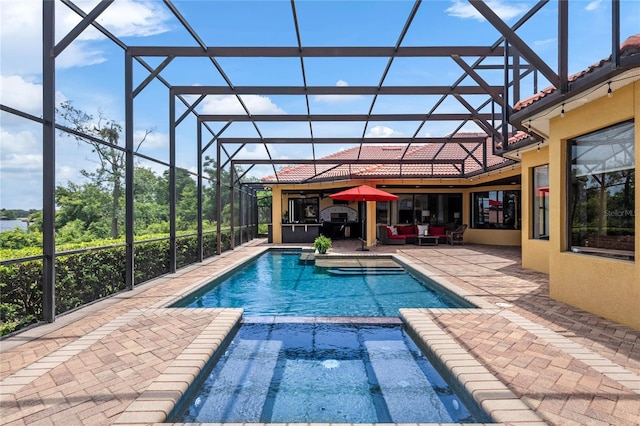 view of swimming pool featuring an outdoor hangout area, a lanai, and a patio area