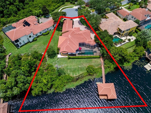 birds eye view of property featuring a water view