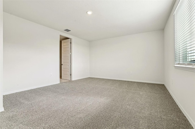 spare room with carpet flooring