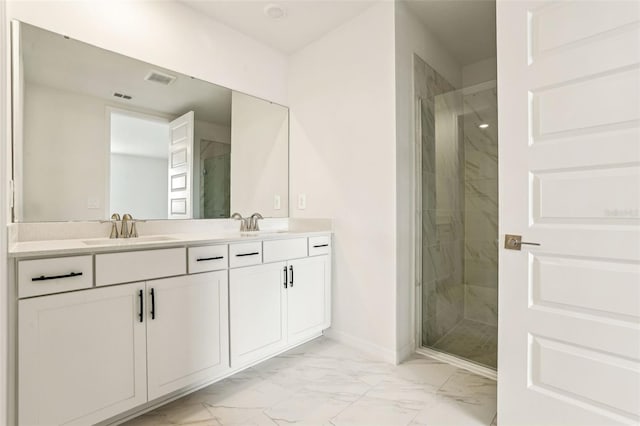 bathroom featuring vanity and walk in shower