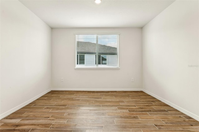 empty room with light wood-type flooring