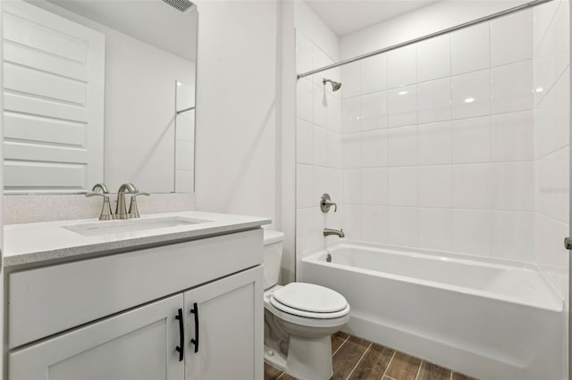 full bathroom with vanity,  shower combination, and toilet