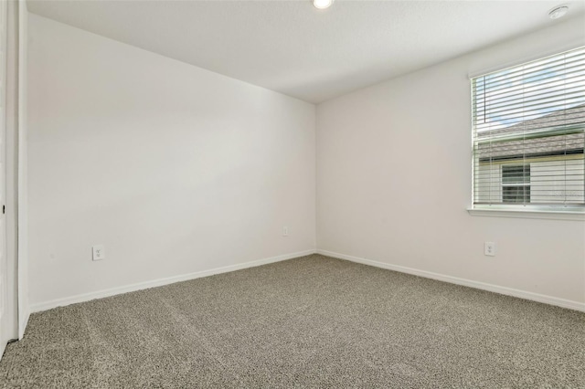 empty room with carpet floors