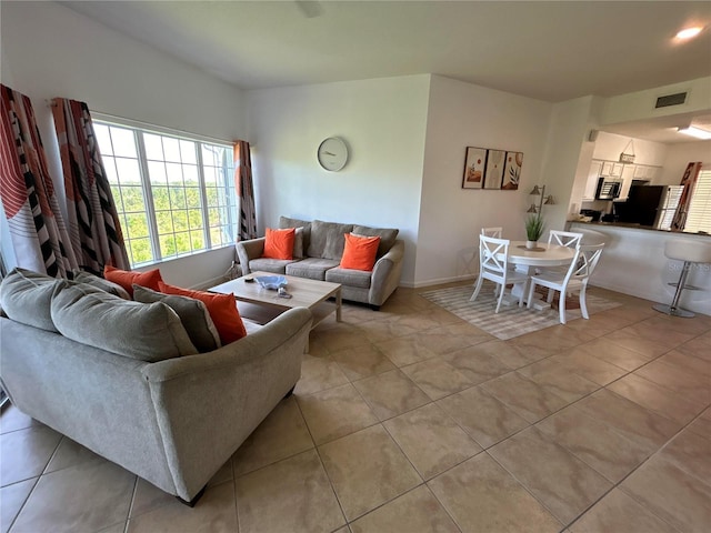 living room featuring light tile patterned floors