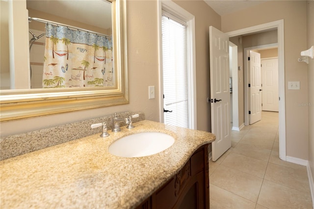 bathroom featuring vanity and tile patterned floors