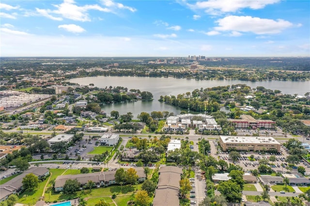 drone / aerial view with a water view