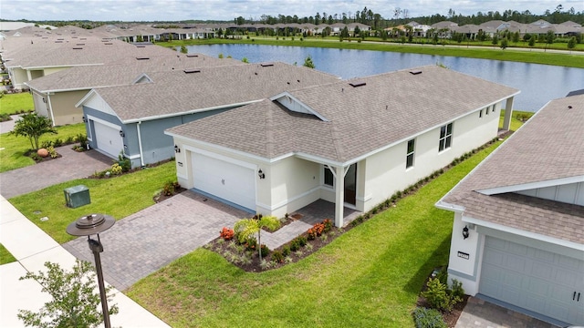 bird's eye view with a water view