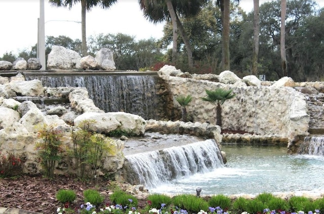 view of property's community featuring a water view