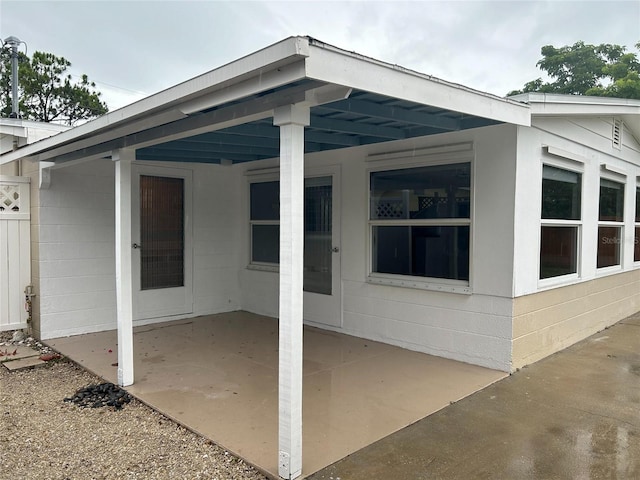 view of patio / terrace featuring a carport