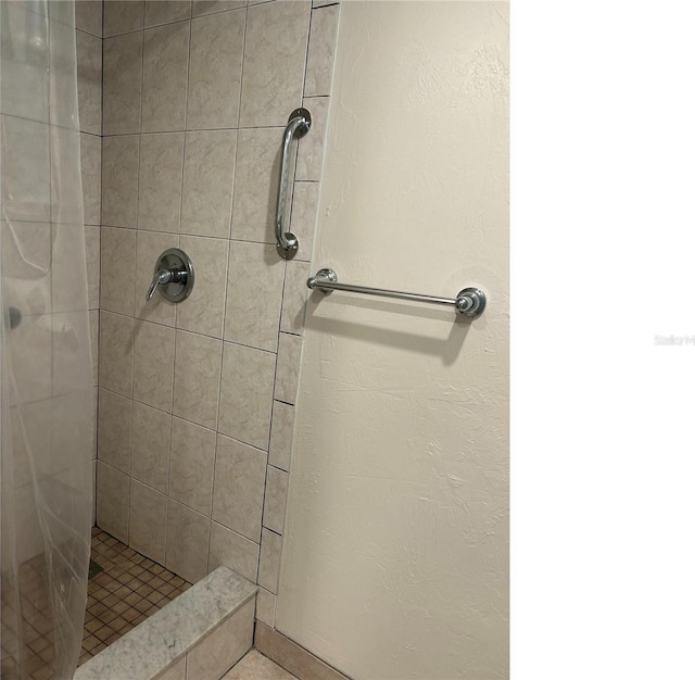 full bathroom with a shower stall