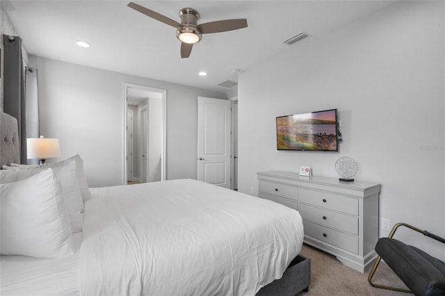 carpeted bedroom featuring ceiling fan