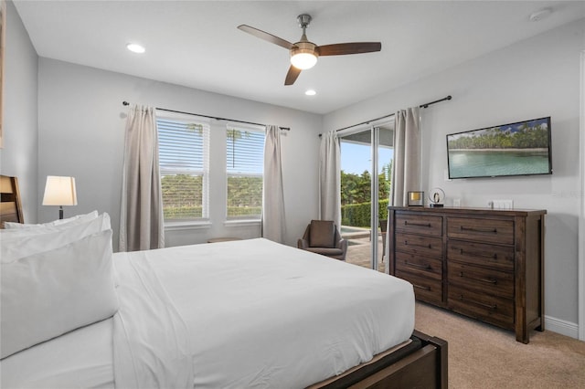 carpeted bedroom with access to exterior and ceiling fan