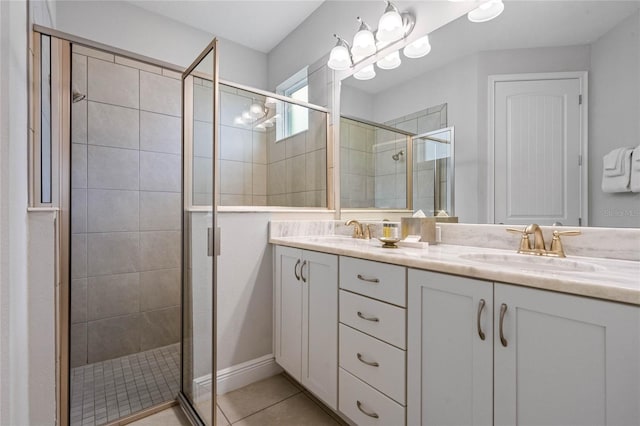 bathroom featuring vanity, tile patterned floors, and an enclosed shower