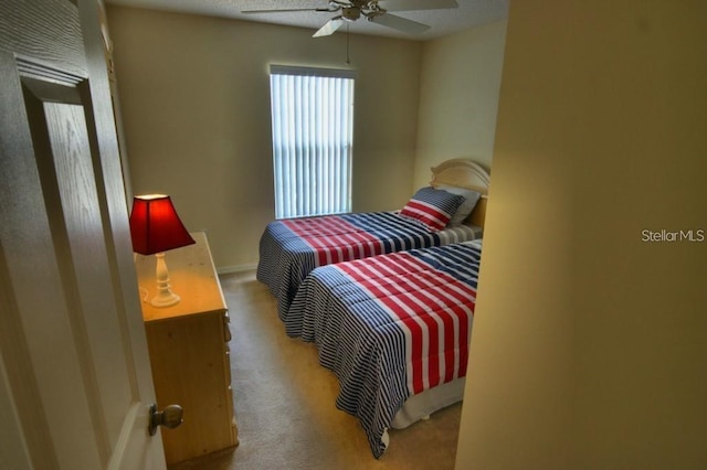 bedroom with carpet and ceiling fan