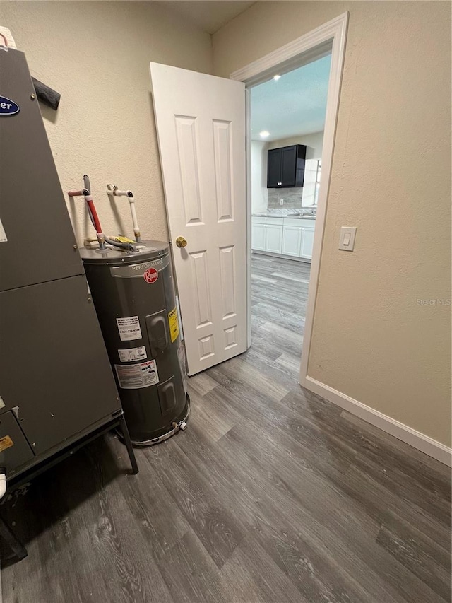 utility room with water heater