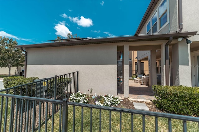 view of home's exterior with a patio