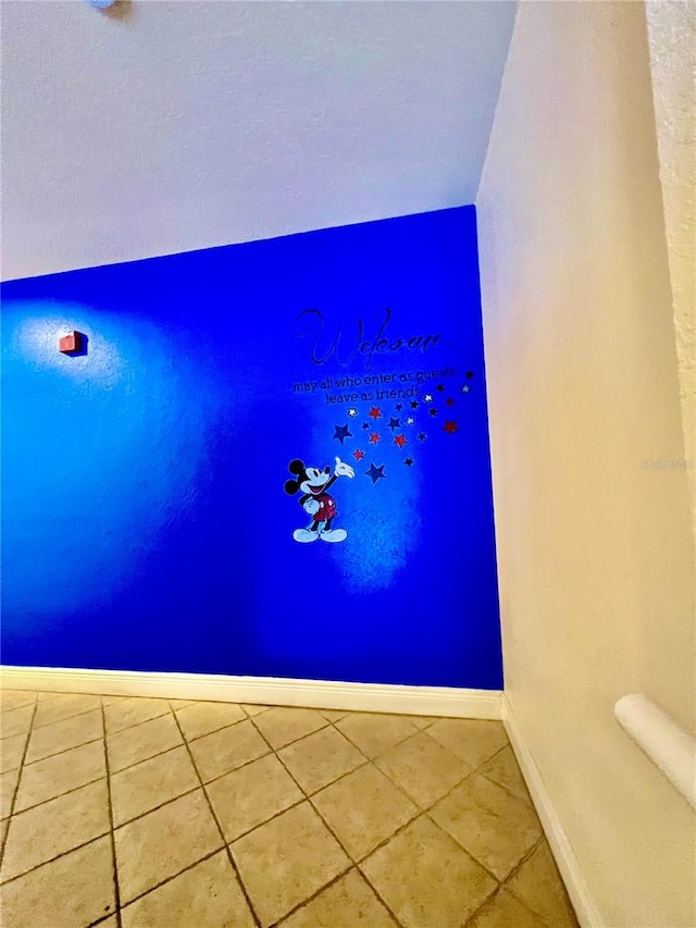 bathroom featuring tile flooring