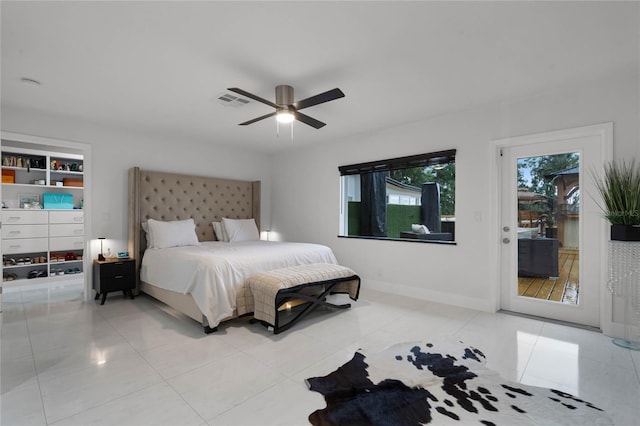 tiled bedroom featuring access to exterior and ceiling fan