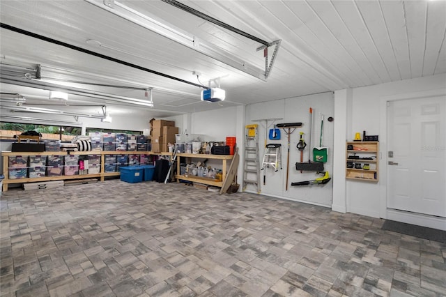 garage featuring a garage door opener