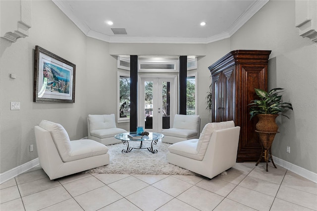 living room with light tile patterned floors, french doors, and ornamental molding