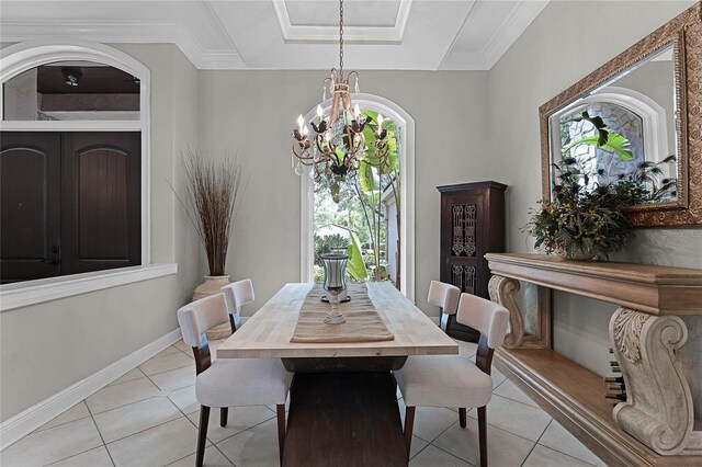 tiled dining space with ornamental molding and a chandelier