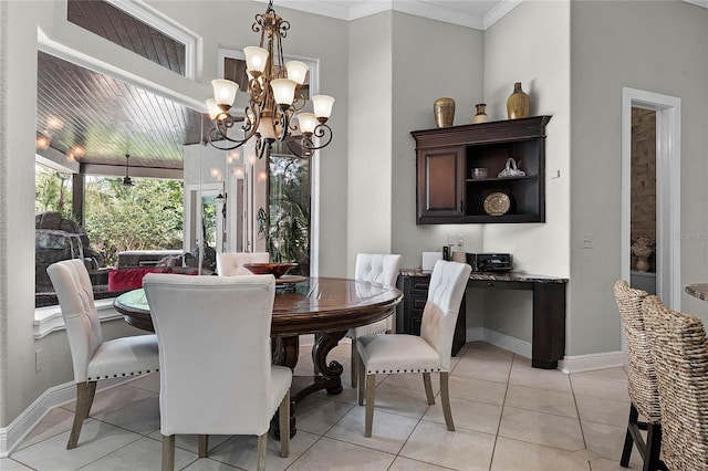 dining area featuring light tile patterned flooring, a notable chandelier, and ornamental molding